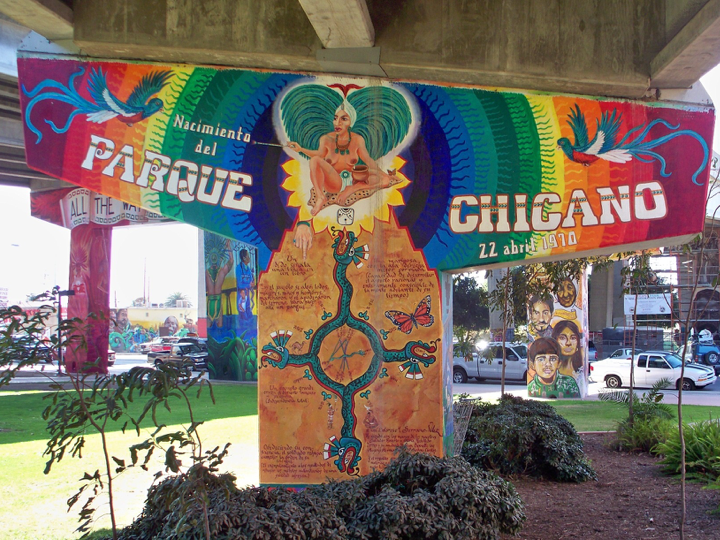 Mural reading Nacamiento del Parque Chicano (n.d.), by Dolores Serrano-Velez, which celebrates the park's creation in April 1970